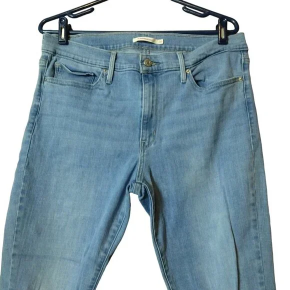 Levi’s Women's Size 33 Slimming Skinny Distressed Light Blue Mid-Rise Jeans - Picture 2 of 6